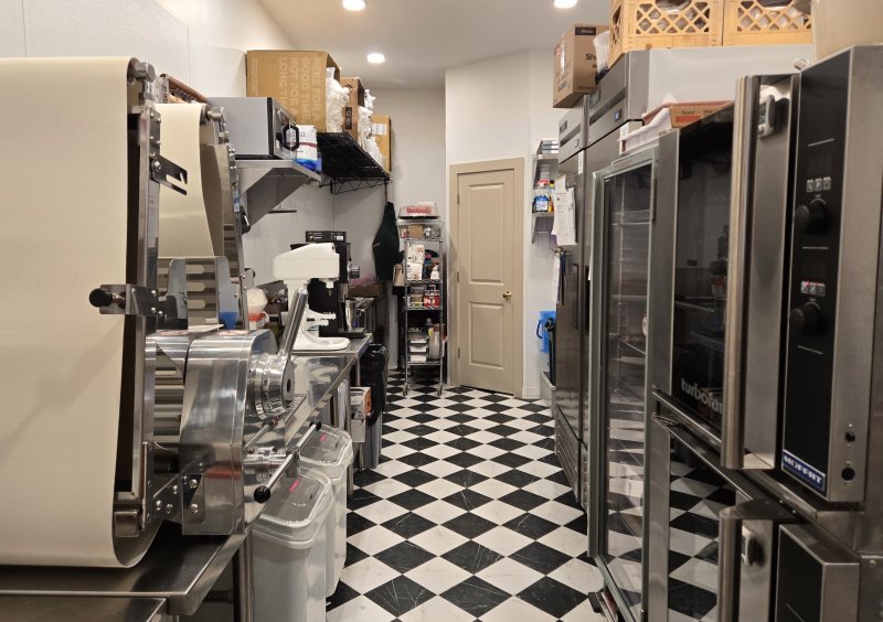 The space needed a front-to-back renovation that included the installation of a kitchen.